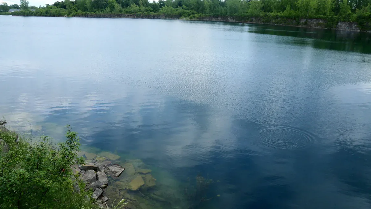 A small lake with rocky shores in Kahnawake, the Mohawk territory near Montréal